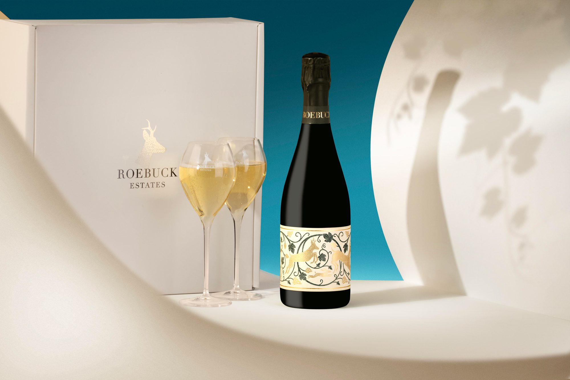 Roebuck rare expressions with two glasses filled with english sparkling wine